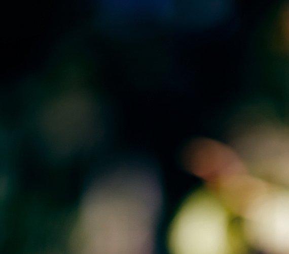 An abstract image of a flower represents Clothing For Positive Change. 